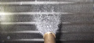 rotary screw compressor overheating causes